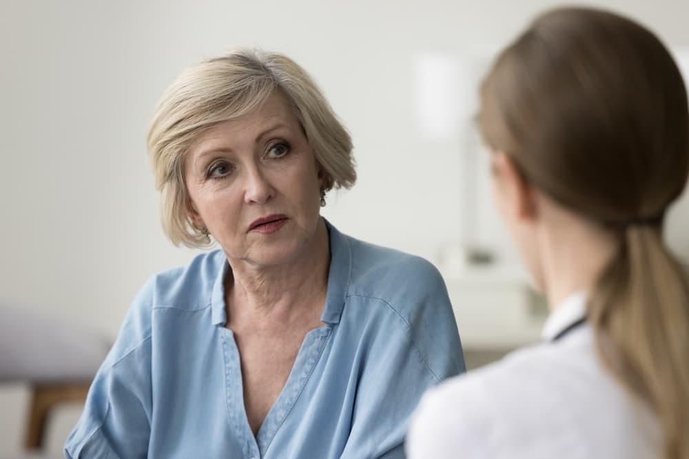 doctor diagnosing a patient
