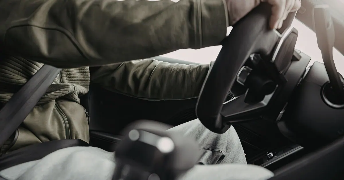 A driver's seatbelt in a car, representing how South Carolina seatbelt laws apply to personal injury cases